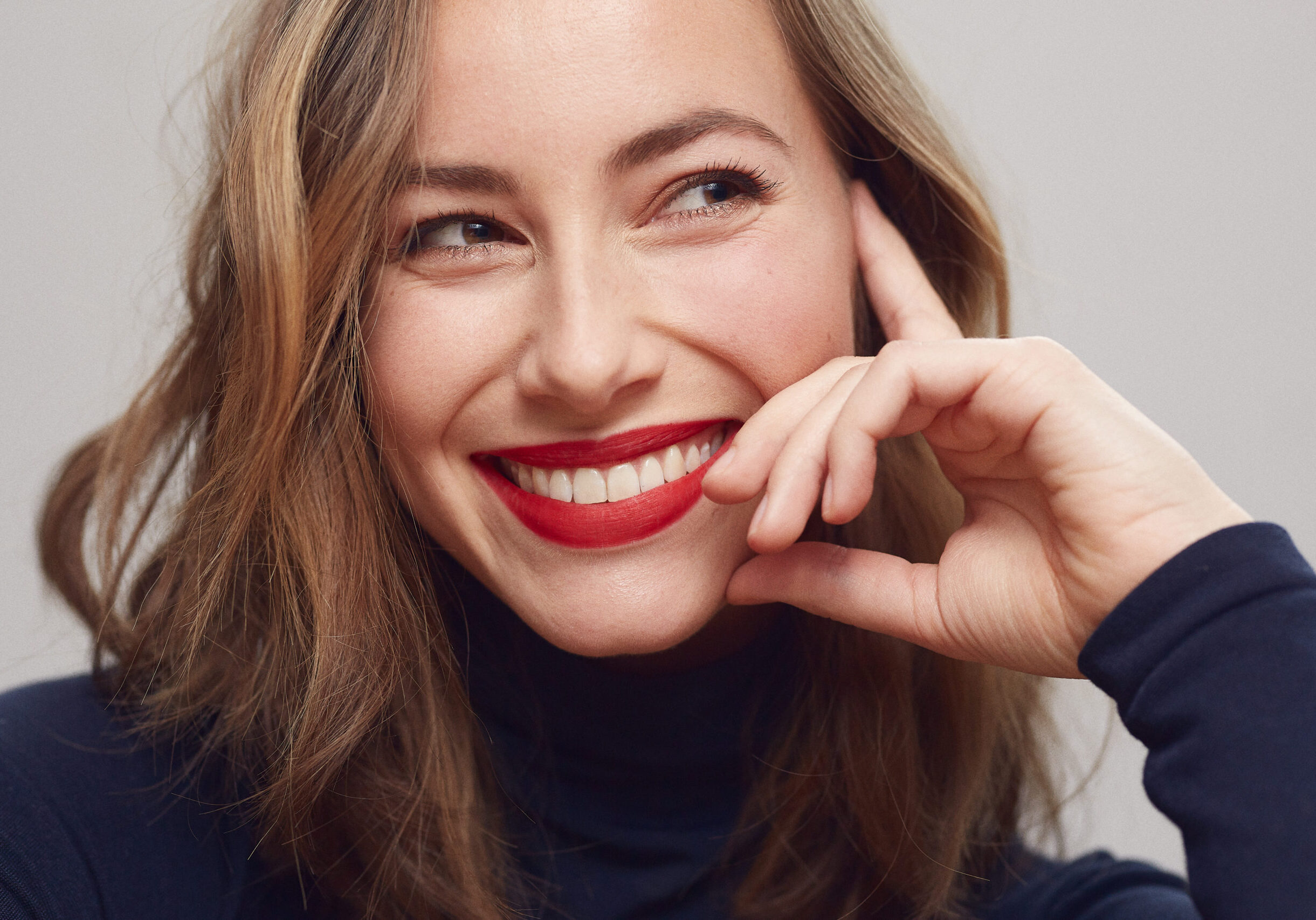 Portrait of a happy and beautiful woman with a big smile on her